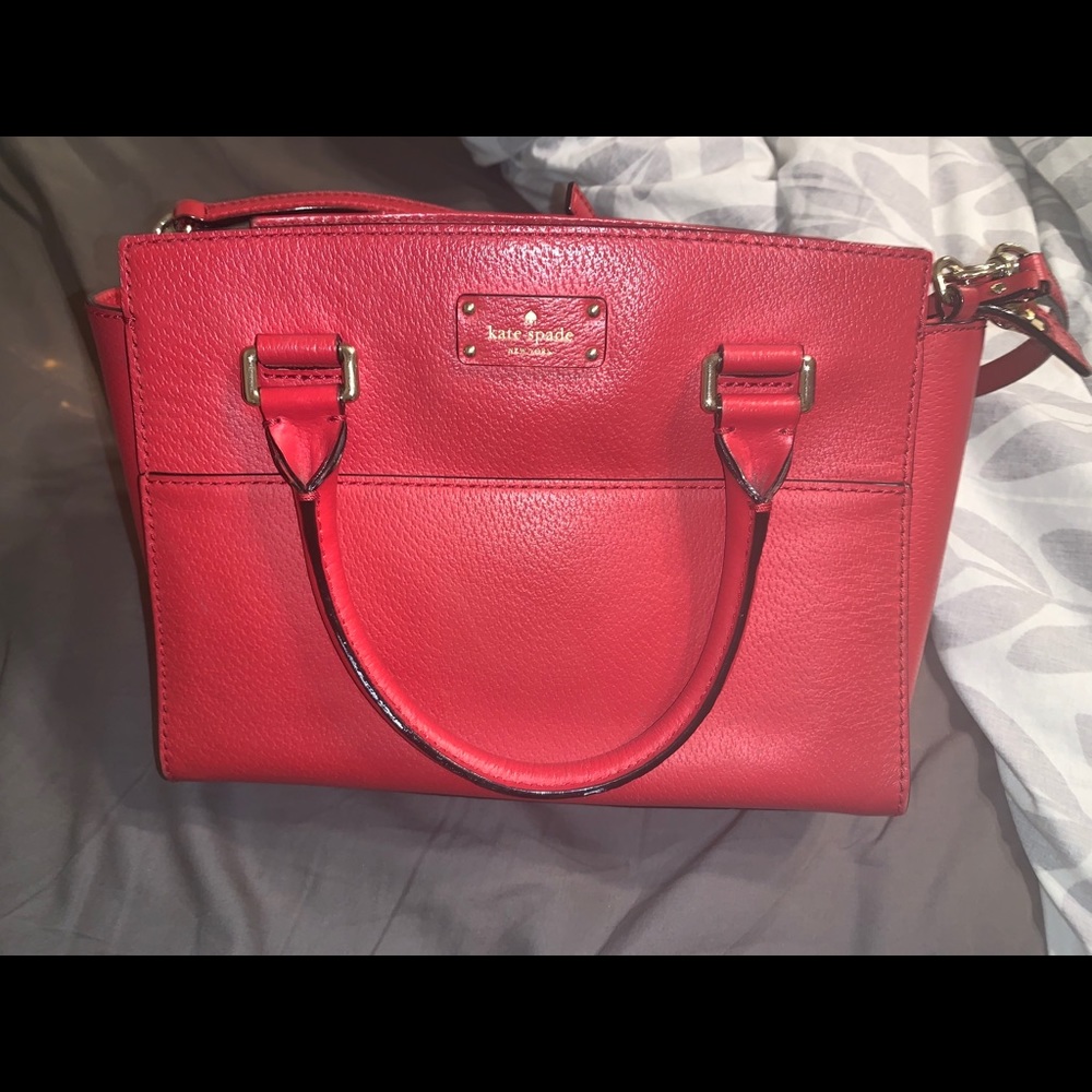 gently used super cute red kate spade purse!